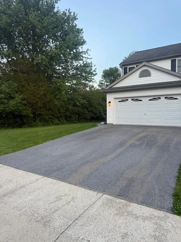 Finished asphalt project after professional maintenance, result 7
